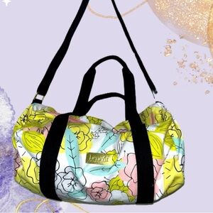 BENEFIT San Francisco Canvas Multi Print Logo Zip Duffle Bag Weekender NWOT